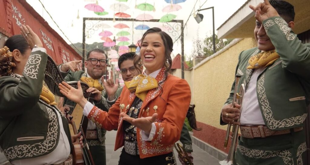 Silvia Zepeda en primer plano promocionando su nuevo sencillo "A ver si tu orgullo", con expresión intensa y fondo artístico.